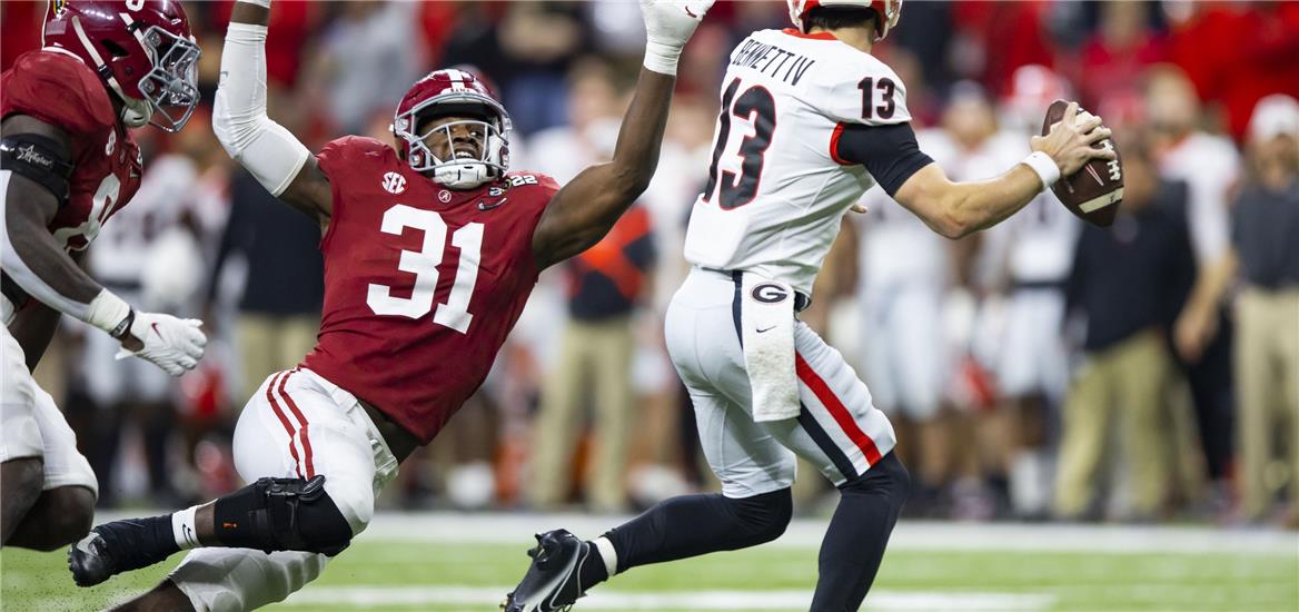 Jan 10, 2022; Indianapolis, IN, USA; Alabama Crimson Tide linebacker Will Anderson Jr. (31) defends against Georgia Bulldogs quarterback Stetson Bennett (13) in the 2022 CFP college football national championship game at Lucas Oil Stadium.  Mark J. Rebilas-USA TODAY Sports

                    