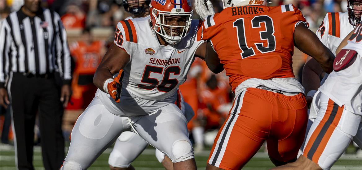 American offensive lineman O'Cyrus Torrence of Florida (56) looks to block National defensive lineman Karl Brooks of Bowling Green (13) during the second half of the Senior Bowl college football game at Hancock Whitney Stadium. Vasha Hunt-USA TODAY Sports
